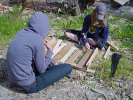children building with natural materials